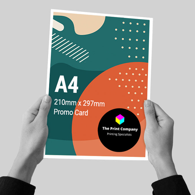 Full-colour A4 promotional card held in two hands, featuring modern design and sharp print finish, deal for posters, product showcases, or in-store point-of-sale material.