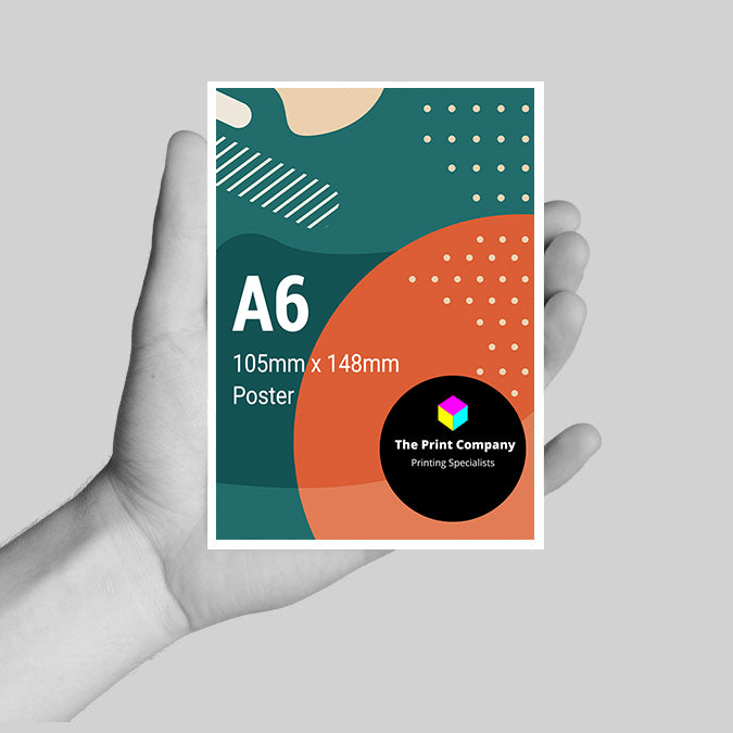 Hand holding a high-quality A6 promotional card, printed at 105mm x 148mm size with vibrant CMYK colours and abstract geometric design, perfect for event marketing, handouts, or mini-flyers from a professional printing company.